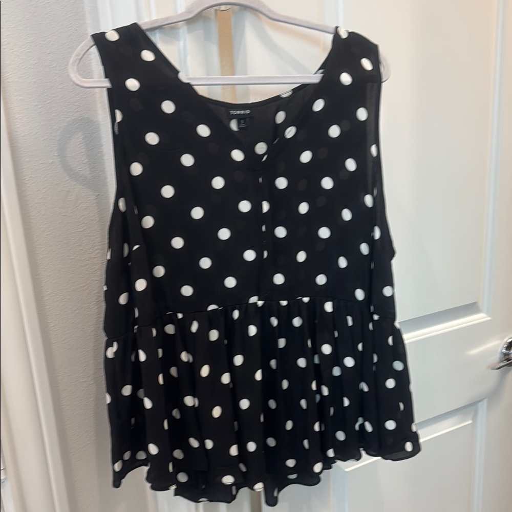 Torrid Black and White Sleeveless Peplum Blouse